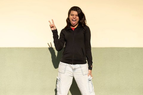 Teenage girl portrait .Expression of happiness, winning attitude and sticking out tongue