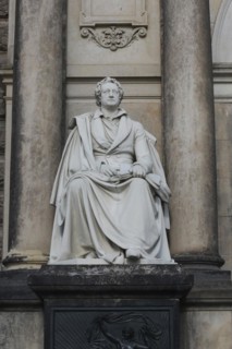 An upright shot of a statue to Germany's most famous poet and writer Johann Wolfgang (von) Goethe
