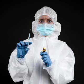 Doctor preparing coronavirus vaccine