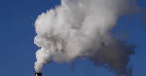 Smokestack of Sugar Refinery with Water Vapour, Near Caen in Normandy