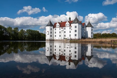 Glücksburg Castle with reflection in the lake, Schleswig-Flensburg, Schleswig-Holstein, Germany,