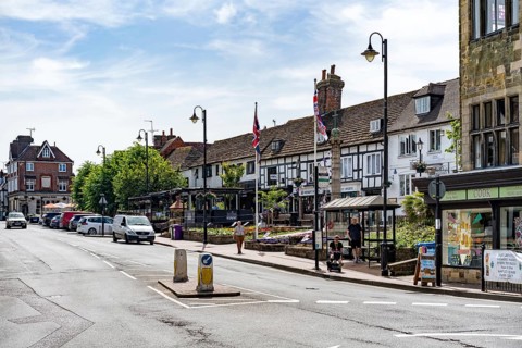 EAST GRINSTEAD, WEST SUSSEX, UK - JUNE 17 : View of the High Street in East Grinstead on June 17,
