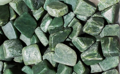 Jade gem stone as natural mineral rock specimen