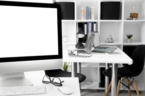 Office desks with computer screen laptop