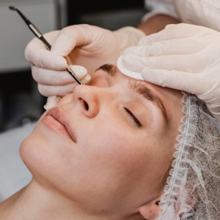 Young woman wellness center during skin treatment