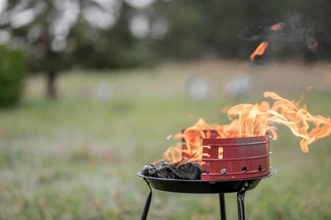 Front view barbecue outdoors with copy space