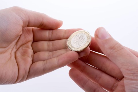 Turkish coin one Turkish Lira in hand