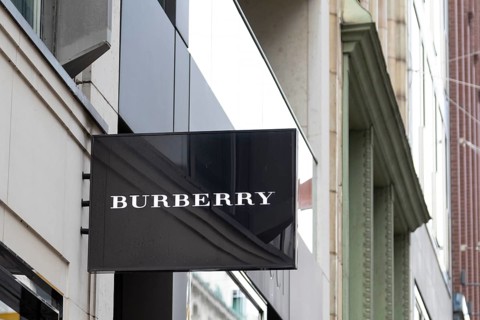 Close-up, logo of the British luxury fashion brand Burberry on a boutique in the shopping street
