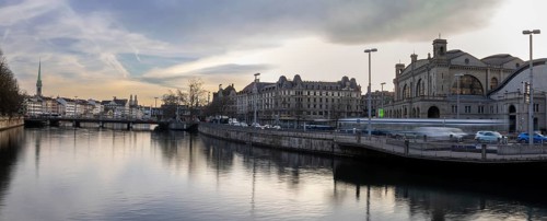 Evening panorama from the Walche Bridge to the main railway station and railway bridge, behind the
