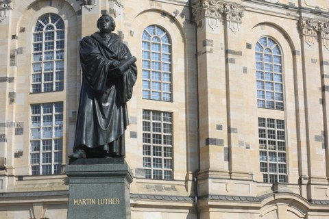 A statue of Martin Luther, preacher, translator and father of the Reformation in front of the
