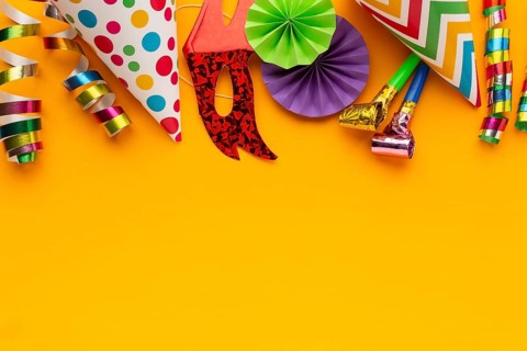Flat lay colored masks decorations copy space