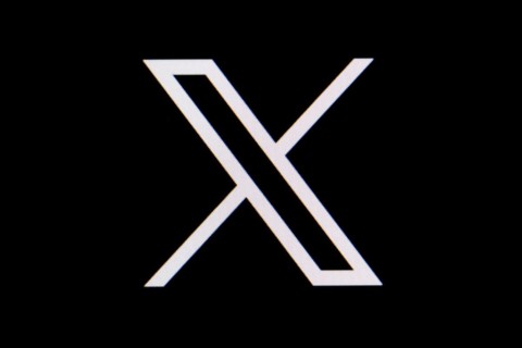 Symbolic image social media, close-up of a black screen with X logo on the website of the short