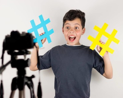 Medium shot blogger with hashtags