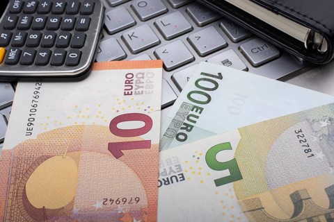 Euro banknotes, calculator Business and finance concept