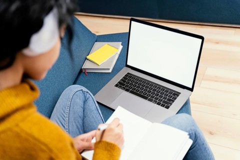 Teenage girl with headphones laptop during online school. Beautiful photo
