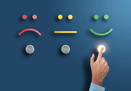customer service rating and survey concept with hand touching interface button with smiling face