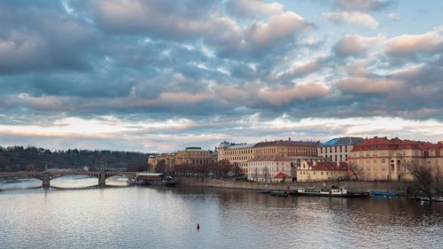 View from the Charles bridge in Prague over the Vlatva river on cloudy day