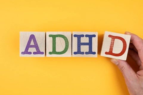 letters ADHD on wooden blocks, Attention Deficit Hyperactivity Disorder concept