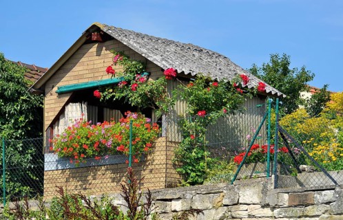 Garden house with flowers