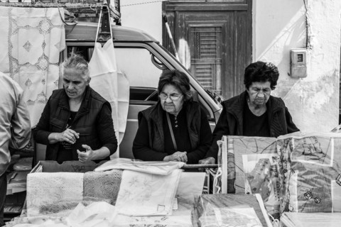 Three women on the farmers market in Tymbaki in the south-central of Crete. The older Ladys have a