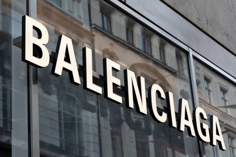 Close-up, logo of the Italian luxury fashion brand Balenciaga on a boutique in the shopping street