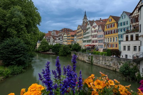 Old town houses in Tübingen with Hölderlin Tower (l.) and St George's Collegiate Church on the