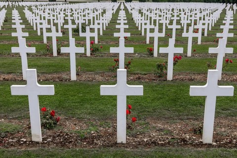 French military cemetery at the Ossuaire de Douaumont with white graves and crosses of fallen