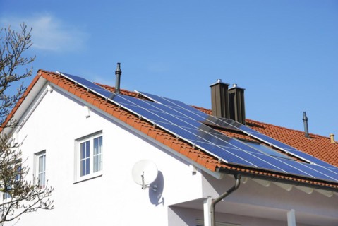 House roof with photovoltaics installation