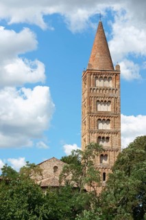 Bell tower and detail of the Church of Pomposa Abbey, a Benedictine monastery in the province of