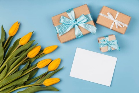Yellow tulips with blank card gifts
