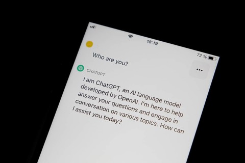 Symbolic image artificial intelligence, detailed view of a smartphone with the app ChatGPT,
