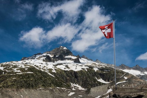 Swiss flag, Galenstock, view from Furka Pass, Rhone Glacier, Canton Valais, Switzerland, Europe