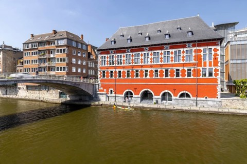 Visit Namur, Office du tourisme de Namur in old red building, on the river Sambre, Namur, Wallonia,