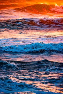 Sunset with high waves at the sea with psychedelic colours, Portbail, English Channel, Cotentin,