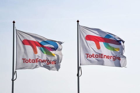 Den Helder, Netherlands. May 2, 2023. Flying flags of Total Energies, a major oil company