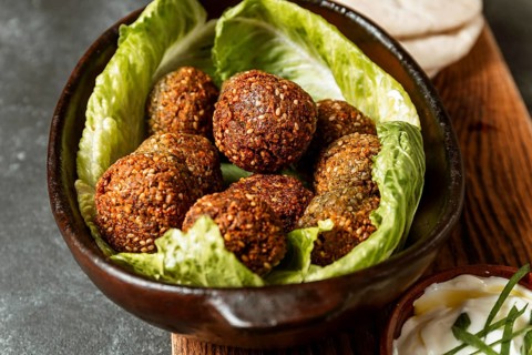 High angle bowl with lettuce falafel