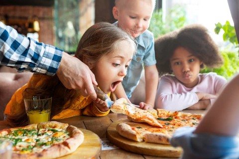 Close up kids with delicious pizza