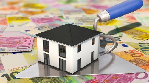 Symbolic image on the topic of construction costs, construction financing, construction loan, home