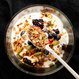 Flat lay yogurt with cereals fruits