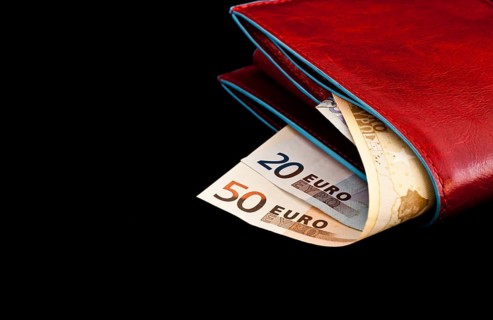 Italian leather wallet with money, useful for concepts