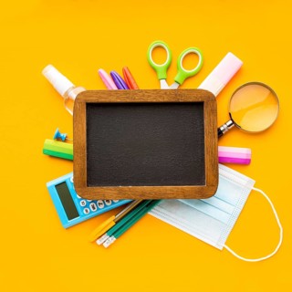 Top view back school essentials with blackboard pencils