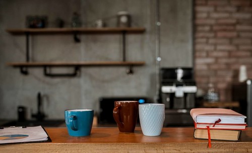 Front view coffee mugs table counter