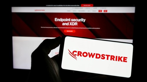 Stuttgart, Germany, 03-31-2023: Person holding smartphone with logo of cybersecurity company