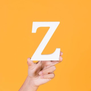Close up hand holding up alphabet z