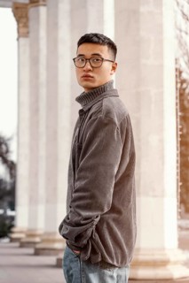 Young japanese man portrait side view