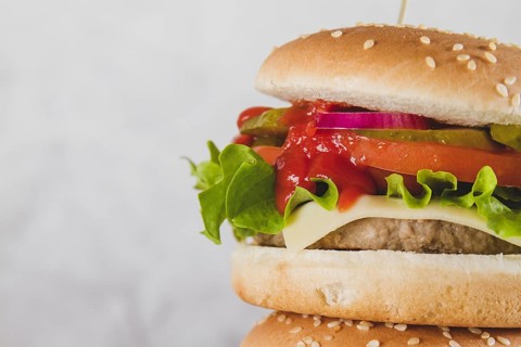 Delicious burger with lettuce cheese. Resolution and high quality beautiful photo