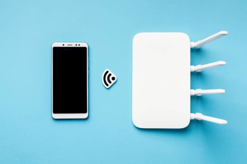 Top view wi fi router with smartphone. High resolution photo