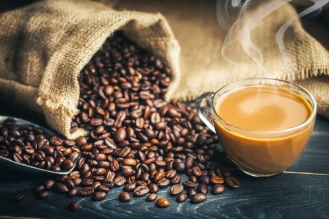 Coffee cup and coffee beans with bag, scoop and smoke, classic concept