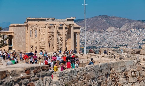 A picture of a crowd of tourists at the Acropolis of Athens