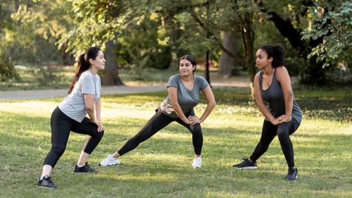 Three female friends training park